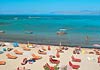 Sunbathe on the beach, Kavos, Corfu